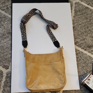 AhDorned Faux Suede Tan Crossbody Bag with Leopard Strap.